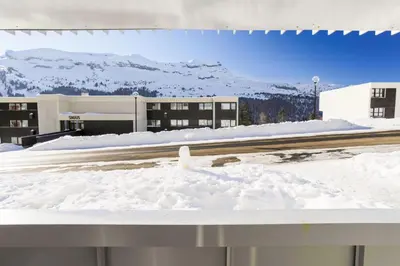 a pile of snow on the roof of a building at Résidence La Petite Ourse - maeva Home - Studio 3 Personnes - Sélection MAE-4901 in Arâches-la-Frasse
