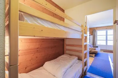 a bedroom with two bunk beds in a house at Résidence Arbaron - maeva Home - Studio 4 personnes - Confort MAE-8638 in Flaine