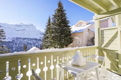a white table on a balcony with snow on it at Résidence Arbaron - maeva Home - Studio 4 personnes - Confort MAE-8638 in Flaine