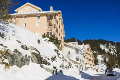 a building on the side of a snow covered mountain at Résidence Le Château de Crans - maeva Home - Studio 4 Personnes - Confort MAE-9176 in Flaine