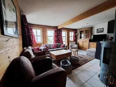 a living room with couches and a table at Les Chalets de Flaine Hameau - maeva Home - Chalet 5 Pièces 8 Personnes - Sélection MAE-2135 in Flaine