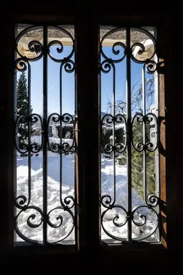 a window with a view of a snow covered yard at Villa la tourelle in Saint-Gervais-les-Bains