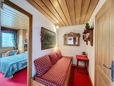 a small room with a couch and a bed at Appartement 2 pièces avec parking, au pied des pistes - FR-1-560-134 in Combloux