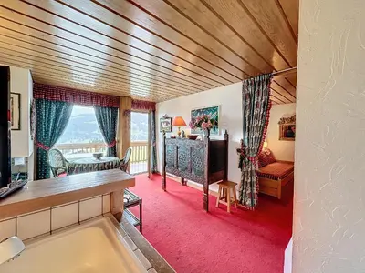 a room with a bath tub in a room with a room at Appartement 2 pièces avec parking, au pied des pistes - FR-1-560-134 in Combloux