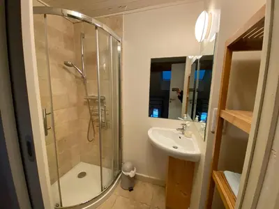 a bathroom with a shower and a sink at Villa Jules in Chamonix-Mont-Blanc
