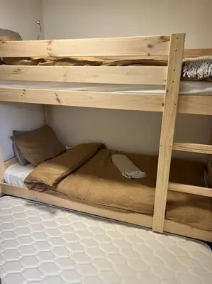 a couple of bunk beds in a room at Appartement à Megève in Demi-Quartier