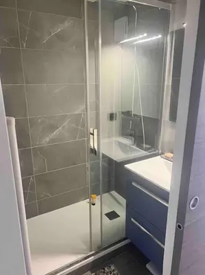 a bathroom with a shower and a sink at Appartement à Megève in Demi-Quartier