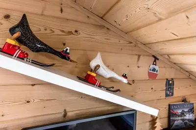 a room with skis on a shelf in a cabin at Balcon du Mont-Blanc - Calme - Central in Chamonix-Mont-Blanc