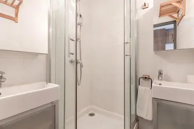 a bathroom with a shower and a sink at Balcon du Mont-Blanc - Calme - Central in Chamonix-Mont-Blanc