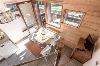 an overhead view of a room with a table and chairs at Balcon du Mont-Blanc - Calme - Central in Chamonix-Mont-Blanc