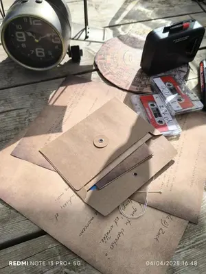 a clock and some brown papers on a table at Bivouac & Sacs à dos - Loft classé, avec escape game sur demande in Sixt