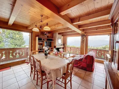 a dining room with a table and chairs at Appartement 3P avec parking proche des pistes à Combloux - FR-1-560-135 in Combloux