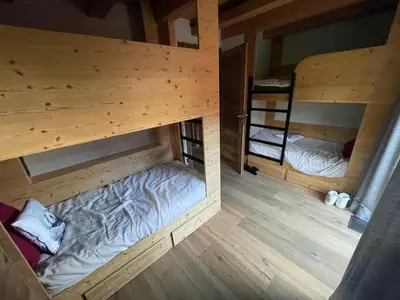 an overhead view of two bunk beds in a room at Appartement Luxe comme un Chalet - vue exceptionnelle in Combloux