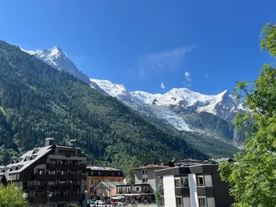 a view of a mountain with snow covered mountains at Residence VARLOPE in Chamonix-Mont-Blanc