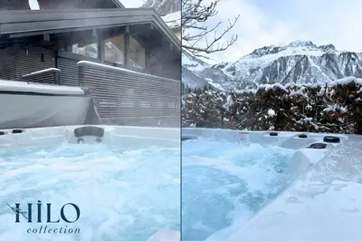 a hot tub covered in snow in front of a mountain at Chalet La Moraine Chamonix Mont Blanc by HILO Collection - 8 people - Jacuzzi and PS5 in Chamonix-Mont-Blanc