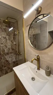 a bathroom with a sink and a mirror at STUDIO DENT DU CROCODILE, AIGUILLE du MIDI, BALCON, PARKING in Chamonix-Mont-Blanc