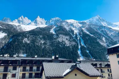 a view of a mountain with snow covered mountains at In the center of Chamonix with views of Mont Blanc in Chamonix-Mont-Blanc