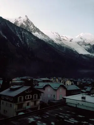 a small town with a mountain in the background at Apartment in Chamonix in Chamonix-Mont-Blanc