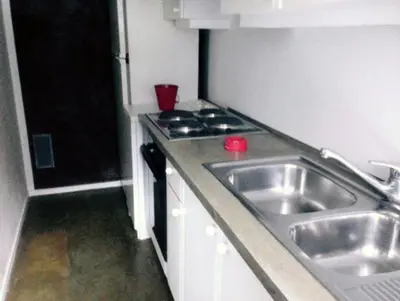a small kitchen with a sink and a stove at Apartment in Chamonix in Chamonix-Mont-Blanc