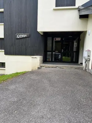a building with a sign on the side of it at studio station des carroz d'arraches in Arâches-la-Frasse