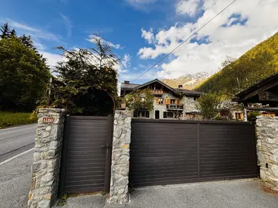 a garage door in front of a house at Appartement Chamonix in Chamonix-Mont-Blanc