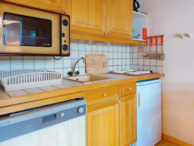 a kitchen with a sink and a microwave at Apartment Isabella by Interhome in Saint-Gervais-les-Bains