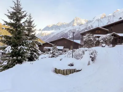 a view from the balcony of a house in the mountains at Apartment Les Hauts des Chavants -2 by Interhome in Les Houches
