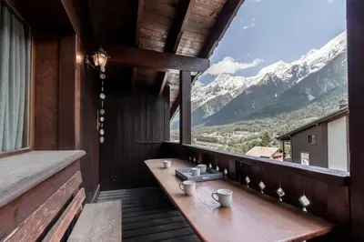 a balcony with a sink and a view of mountains at Grand Balcon 3 - Calme - Vues - Cosy in Les Houches