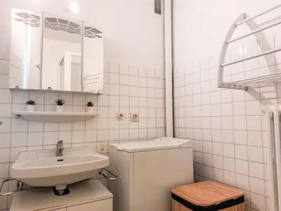 a room with a table and a large window at Apartment La côte du Parc-1 by Interhome in Saint-Gervais-les-Bains