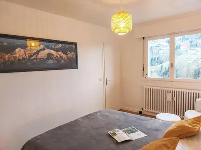 a view of a city with mountains in the background at Apartment La côte du Parc-1 by Interhome in Saint-Gervais-les-Bains