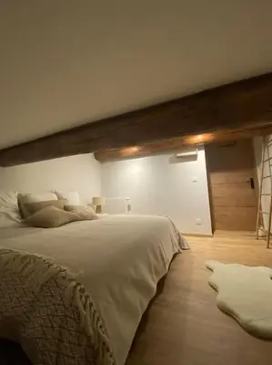 a bedroom with a large bed in a room at Appartement Brévent in Les Houches