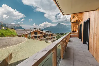 a balcony with a view of a mountain at Appartement Boréal - At the summit of Combloux in Combloux