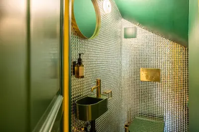 a bathroom with a sink and a mirror at Three Bedroom Chalet Lemon Pit Chamonix in Chamonix-Mont-Blanc