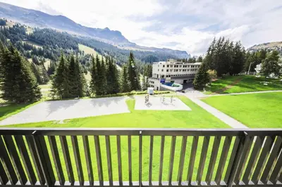 a view from the balcony of a building with a park at Résidence Aldébaran - maeva Home - Appartement 2 Pièces 6 Personnes - Confort MAE-3790 in Arâches-la-Frasse