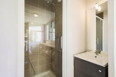a bathroom with a shower and a sink at Résidence La Petite Ourse - maeva Home - Appartement 3 Pièces 8 Personnes - Confort MAE-3901 in Arâches-la-Frasse