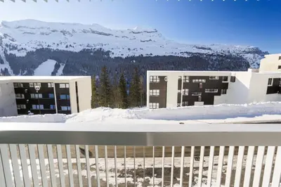a view of the mountains from the balcony of a resort at Résidence La Petite Ourse - maeva Home - Appartement 3 Pièces 8 Personnes - Confort MAE-3901 in Arâches-la-Frasse