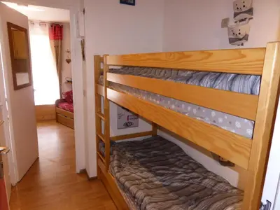 a bunk bed in a room with a hallway at Résidence Pierres Blanches - Pierres Blanches F392 MAE-9901 in Les Contamines-Montjoie