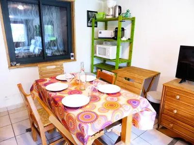 a dining room table with a colorful table cloth on it at Résidence L'air Du Temps - L'Air du Temps 10 MAE-1321 in Les Contamines-Montjoie