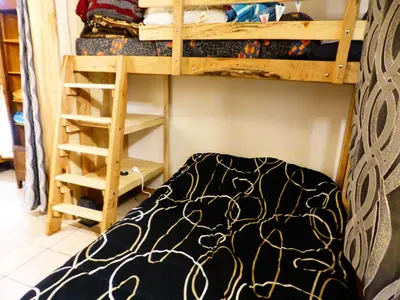 a bedroom with a bunk bed and a ladder at Résidence L'air Du Temps - L'Air du Temps 10 MAE-1321 in Les Contamines-Montjoie