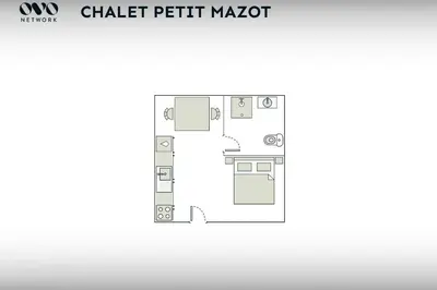 a floor plan of a kitchen and living room with furniture at Petit Mazot La Chandelle - OVO Network in Bionnassay