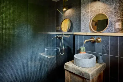 a bathroom with a sink and a shower at Chalet La Chandelle - OVO Network in Bionnassay