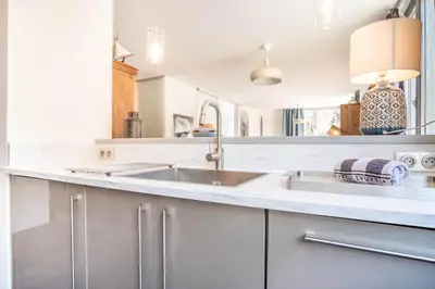 a kitchen with a sink and a counter at Appt Daisy - Familial - Calme - Vues in Chamonix-Mont-Blanc