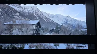 a view of a snowy mountain from a window at Alpine Escape Mont Blanc at Your Window in Chamonix-Mont-Blanc