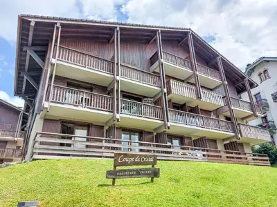 a large building with a sign in front of it at Apartment La Coupe de Cristal-7 by Interhome in Saint-Gervais-les-Bains
