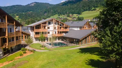an aerial view of a large wooden house at L'Eclat des Veriaz - Megève Appartement 2 chambres, Résidence de standing in Megève