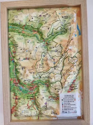 a picture of a map in a wooden frame at Adret1 in Passy