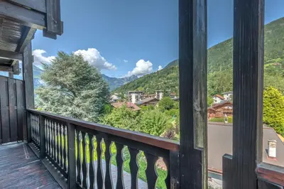 a view from the balcony of a house with a view at Duplex de Miage - Welkeys in Saint-Gervais-les-Bains
