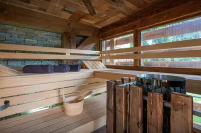 a living room with a gym with a treadmill at Chalet K1027 - OVO Network in Cordon