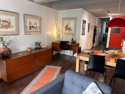a living room with a couch and a table at Confortable appartement 3 pièces · Proche des pistes · WIFI · 6 pers - FR-1-425-225 in Arâches-la-Frasse