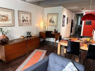 a living room with a couch and a table at Résidence Cassiopee - Appartement tout confort · proche des pistes · WIFI gratuit · vue pistes MAE-0471 in Magland